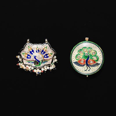 Lot 198 - A GROUP OF TWO ENAMELED ‘PEACOCK’ PENDANTS, NORTHERN INDIA, 19TH CENTURY