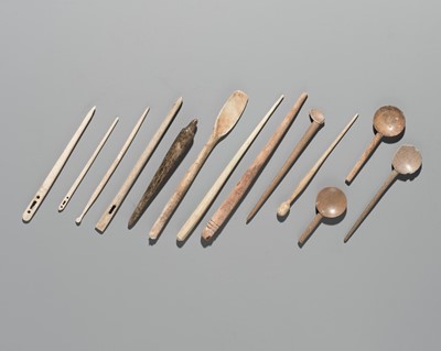 Lot 172 - A GROUP OF THIRTEEN BONE SPOONS, NEEDLES, AND PINS, 1ST MILLENNIUM AD OR EARLIER