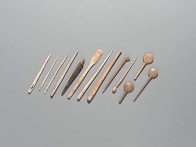 Lot 172 - A GROUP OF THIRTEEN BONE SPOONS, NEEDLES, AND PINS, 1ST MILLENNIUM AD OR EARLIER