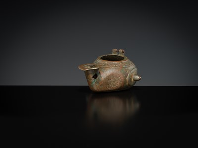 Lot 158 - A GROUP OF THREE BRONZE OIL LAMPS