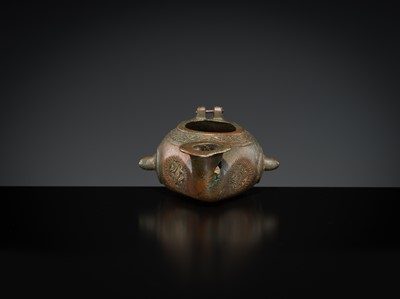 Lot 158 - A GROUP OF THREE BRONZE OIL LAMPS