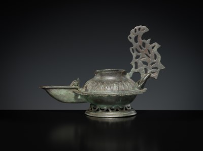 Lot 158 - A GROUP OF THREE BRONZE OIL LAMPS