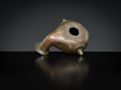 Lot 158 - A GROUP OF THREE BRONZE OIL LAMPS