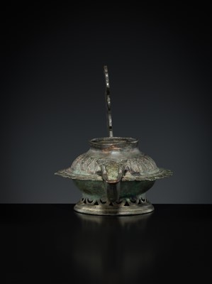 Lot 158 - A GROUP OF THREE BRONZE OIL LAMPS