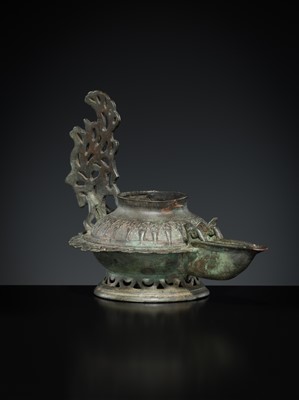 Lot 158 - A GROUP OF THREE BRONZE OIL LAMPS