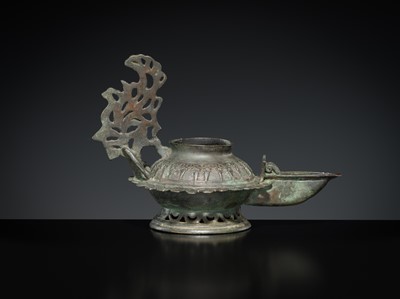 Lot 158 - A GROUP OF THREE BRONZE OIL LAMPS