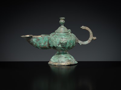 Lot 158 - A GROUP OF THREE BRONZE OIL LAMPS