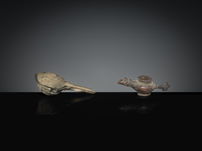 Lot 166 - A BRONZE MORTAR AND OIL LAMP, LATE ROMAN TO EARLY ISLAMIC PERIOD, CIRCA 1ST MILLENNIUM AD