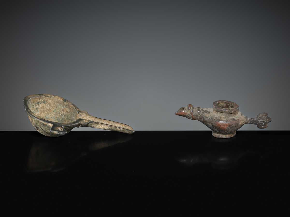 Lot 166 - A BRONZE MORTAR AND OIL LAMP, LATE ROMAN TO EARLY ISLAMIC PERIOD, CIRCA 1ST MILLENNIUM AD