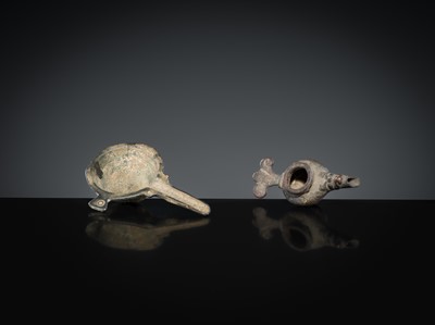 Lot 166 - A BRONZE MORTAR AND OIL LAMP, LATE ROMAN TO EARLY ISLAMIC PERIOD, CIRCA 1ST MILLENNIUM AD