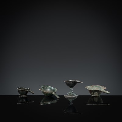 Lot 167 - A GROUP OF FOUR EARLY ISLAMIC BRONZE COSMETIC MORTARS, CIRCA 7TH-12TH CENTURY