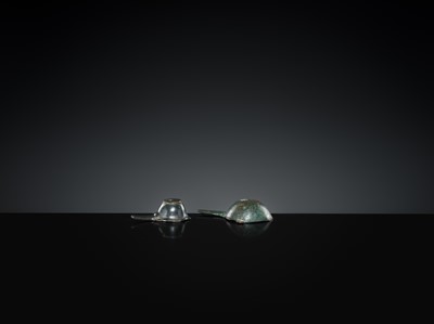 Lot 167 - A GROUP OF FOUR EARLY ISLAMIC BRONZE COSMETIC MORTARS, CIRCA 7TH-12TH CENTURY