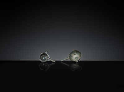 Lot 167 - A GROUP OF FOUR EARLY ISLAMIC BRONZE COSMETIC MORTARS, CIRCA 7TH-12TH CENTURY