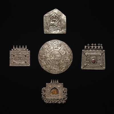 Lot 203 - A GROUP OF FIVE SILVER REPOUSSÉ AMULET PENDANTS AND PILGRIMAGE PLAQUES