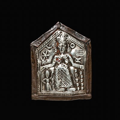 Lot 204 - A GROUP OF SIX SILVER REPOUSSÉ AMULET PENDANTS AND VOTIVE PLAQUE, HIMACHAL PRADESH AND RAJASTHAN