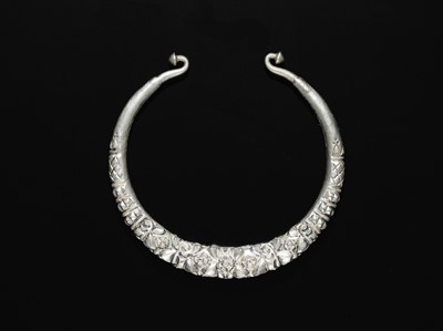 Lot 200 - A GROUP OF ONE COPPER AND TWO SILVER NECK TORQUES, 19TH-20TH CENTURY