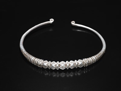 Lot 200 - A GROUP OF ONE COPPER AND TWO SILVER NECK TORQUES, 19TH-20TH CENTURY