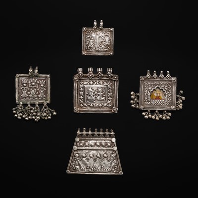Lot 110 - A FINE GROUP OF FIVE SILVER REPOUSSÉ AMULETS, HIMACHAL PRADESH AND RAJASTHAN