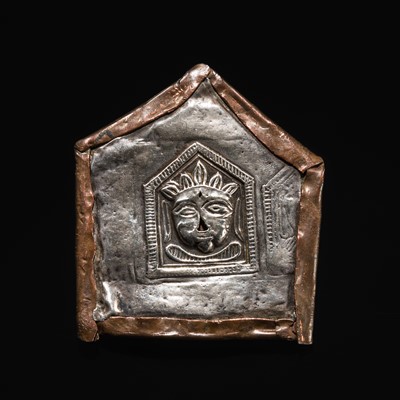 Lot 109 - A GROUP OF THREE SILVER REPOUSSÉ VOTIVE PLAQUES AND A PILGRIMAGE AND DEVOTIONAL PENDANT, PHUL, MAHARASHTRA, 19TH CENTURY OR EARLIER