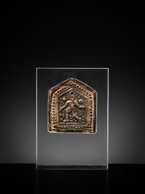 Lot 109 - A GROUP OF THREE SILVER REPOUSSÉ VOTIVE PLAQUES AND A PILGRIMAGE AND DEVOTIONAL PENDANT, PHUL, MAHARASHTRA, 19TH CENTURY OR EARLIER