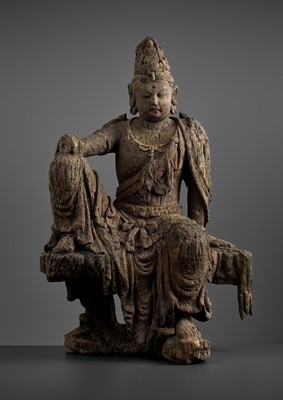 Lot 496 - A LARGE AND MASSIVE WOOD STATUE OF GUANYIN, MING DYNASTY