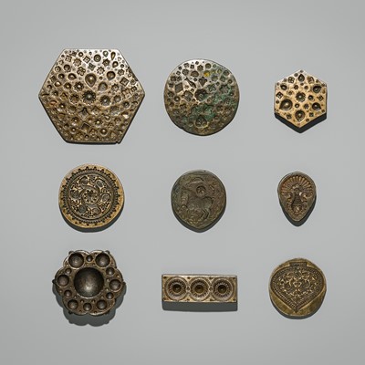 Lot 214 - A GROUP OF NINE BRASS JEWELER’S MOLDS, INDIA, 20TH CENTURY OR EARLIER