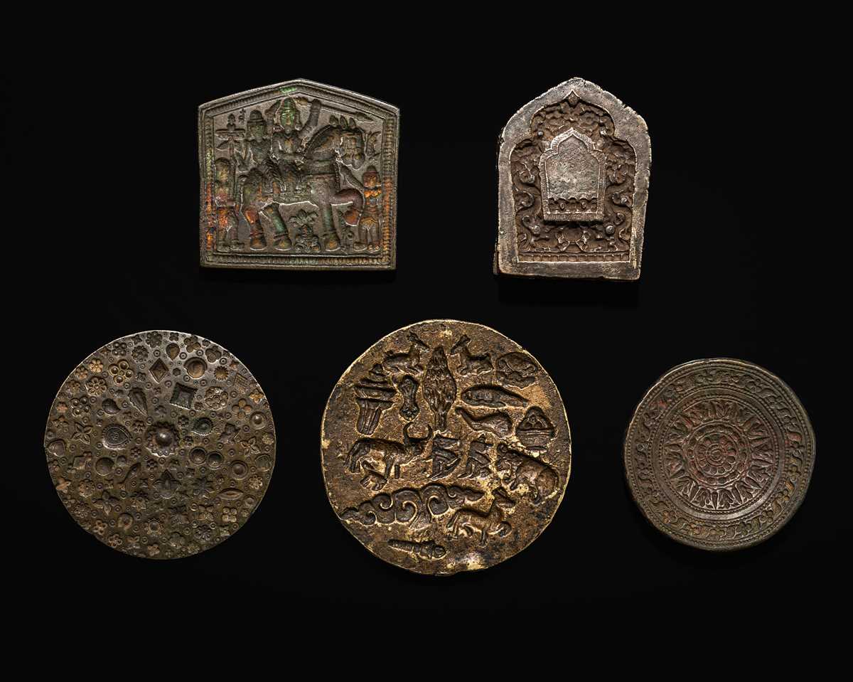 Lot 111 - A GROUP OF RARE BRONZE AND BRASS MOLDS WITH LOTUS AND ANIMALS