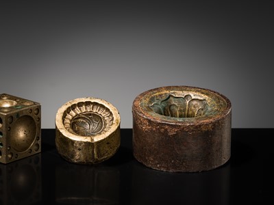 Lot 112 - A GROUP OF FIVE BUDDHIST BRONZE MOLDS WITH GANKYIL AND LOTUS