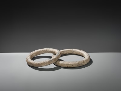Lot 57 - A RARE PAIR OF LARGE STONE RINGS, PREDYNASTIC PERIOD