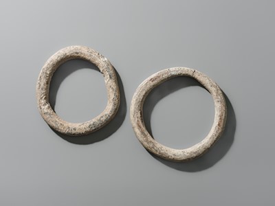 Lot 57 - A RARE PAIR OF LARGE STONE RINGS, PREDYNASTIC PERIOD
