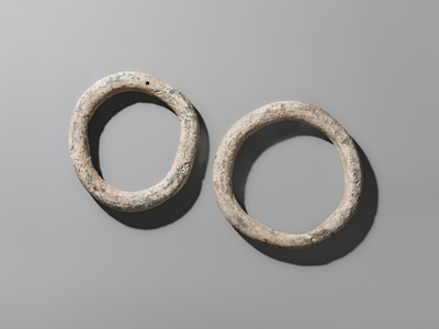 Lot 57 - A RARE PAIR OF LARGE STONE RINGS, PREDYNASTIC PERIOD