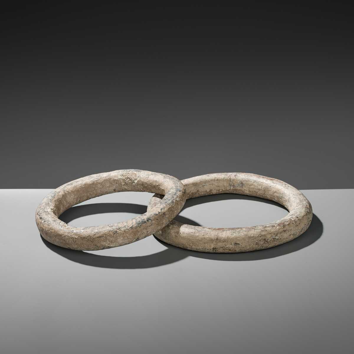 Lot 57 - A RARE PAIR OF LARGE STONE RINGS, PREDYNASTIC PERIOD