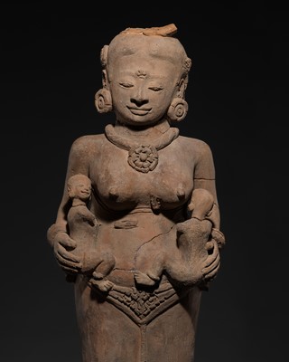 Lot 187 - A MAJAPAHIT TERRACOTTA FIGURE OF HARITI, MEN BRAJUT
