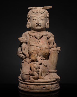 Lot 190 - A MAJAPAHIT TERRACOTTA FIGURE OF A MOTHER GODDESS