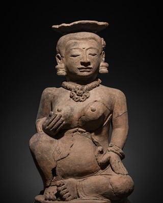 Lot 514 - A MAJAPAHIT TERRACOTTA FIGURE OF A NOBLE WOMAN