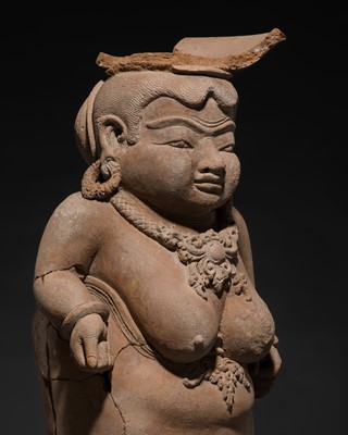 Lot 189 - A MAJAPAHIT TERRACOTTA FIGURE OF A MOTHER