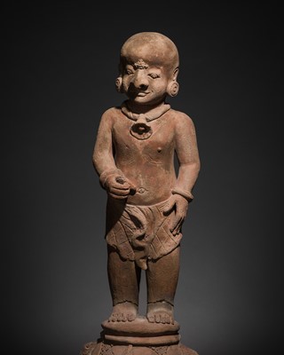 Lot 308 - A MAJAPAHIT TERRACOTTA FIGURE OF A PUNAKAWAN, ROYAL SERVANT