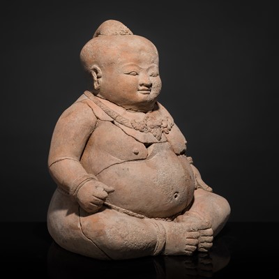 Lot 202 - A MAJAPAHIT TERRACOTTA FIGURE OF CHUBBY LITTLE BOY