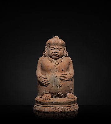 Lot 479 - A MAJAPAHIT TERRACOTTA FIGURE OF A PUNAKAWAN, ROYAL SERVANT