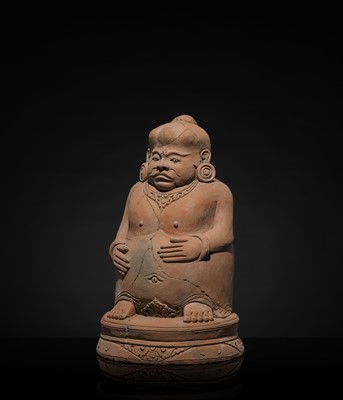 Lot 479 - A MAJAPAHIT TERRACOTTA FIGURE OF A PUNAKAWAN, ROYAL SERVANT