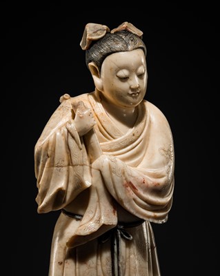 Lot 129 - A SOAPSTONE 'GAOSHAN' FIGURE OF HAN XIANGZI, EARLY QING DYNASTY
