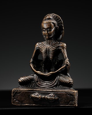 Lot 648 - A SMALL BRONZE FIGURE OF THE EMACIATED BUDDHA, RATTANAKOSIN PERIOD