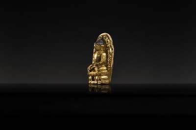 Lot 275 - A GILT-BRONZE VOTIVE PLAQUE OF BUDDHA AKSHOBHYA, TIBET, 18TH CENTURY