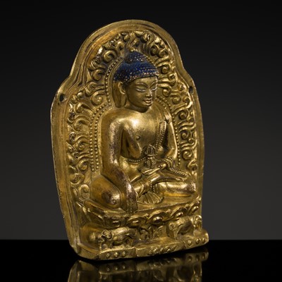 Lot 275 - A GILT-BRONZE VOTIVE PLAQUE OF BUDDHA AKSHOBHYA, TIBET, 18TH CENTURY
