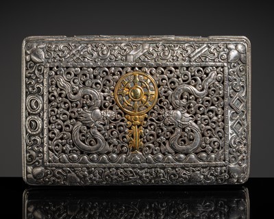 Lot 295 - A PARCEL-GILT SILVER 'BUDDHIST EMBLEMS' BOX, TIBET, 19TH CENTURY