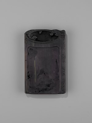Lot 31 - AN INSCRIBED DUAN INKSTONE AND FITTED HUANGHUALI BOX, QING