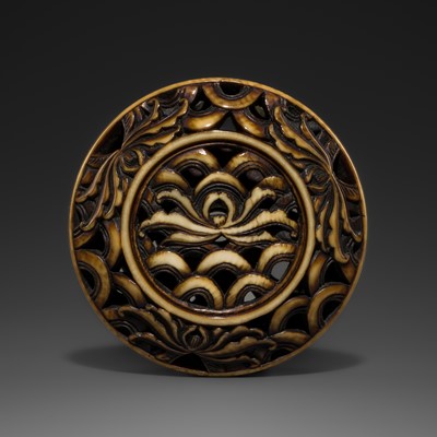 Lot 523 - SHOUNSAI: A FINE IVORY RYUSA MANJU NETSUKE WITH ORCHIDS AND WAVES