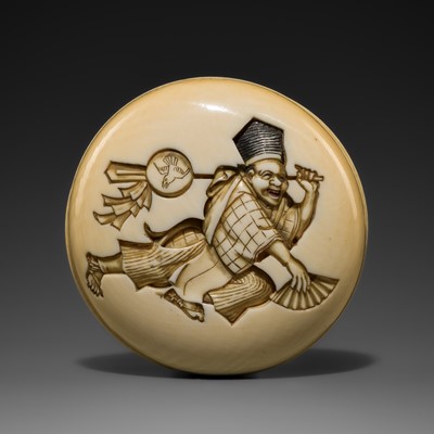 HOJITSU: A FINE IVORY MANJU NETSUKE OF A SAMBASO DANCER