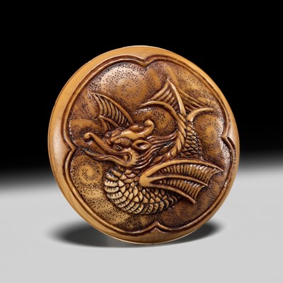 Lot 326 - A FINE IVORY MANJU NETSUKE WITH A SHACHIHOKO (DRAGONFISH)
