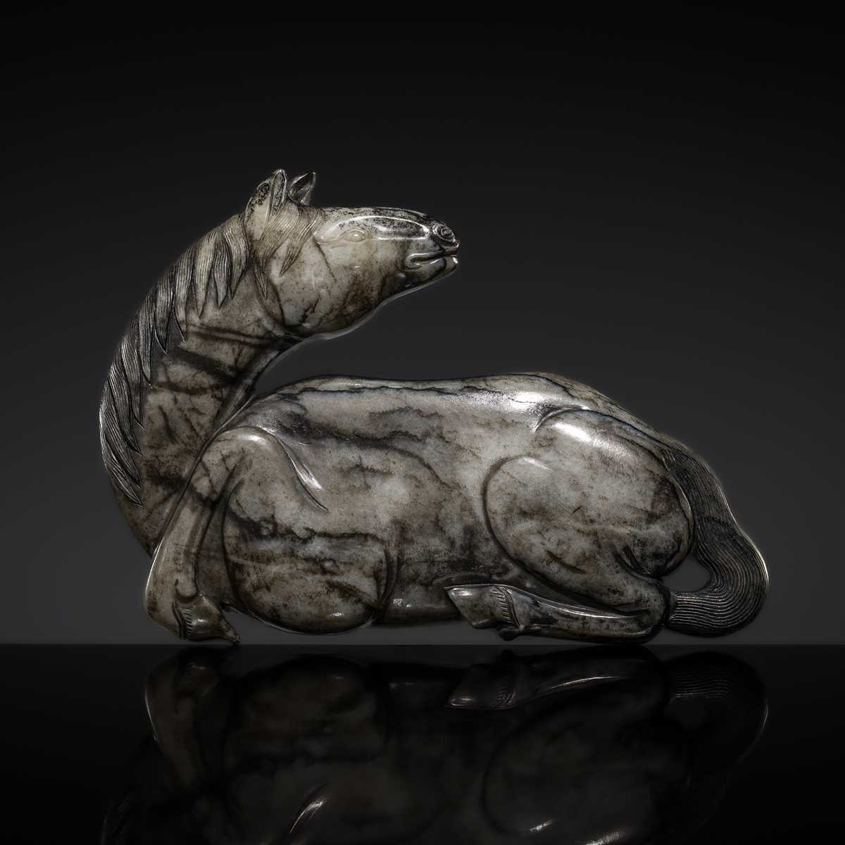 A GREY AND BLACK JADE ‘HORSE’ APPLIQUÉ, MING DYNASTY